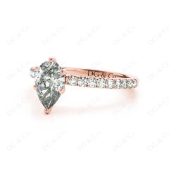 Marquise Cut Claw Set Diamond ring with pave set side stone in 18K Rose
