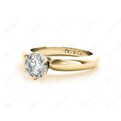 Round cut classic diamond solitaire ring with six claws setting in 18K Yellow
