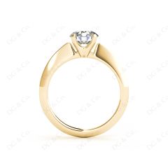 Round Cut Solitaire Diamond Engagement Ring with Four Prong set centre stone and a Knife Edge Band in 18K Yellow