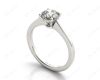 Round Cut Diamond Engagement Ring with Claw set centre stone in Platinum