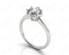 Round Cut Diamond Engagement Ring with Claw set centre stone in Platinum