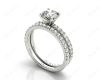 Round Cut Diamond Engagement ring with claw set centre stone in Platinum