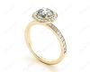 Round cut halo diamond engagement ring with four claw setting in 18K Yellow