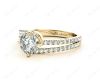 Round Cut Split Shank Diamond Engagement Ring with a Twist Band and Pave Set Side Stones in 18K Yellow