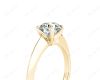 Round Cut Solitaire Diamond Engagement Ring with Four Prong set centre stone and a Knife Edge Band in 18K Yellow