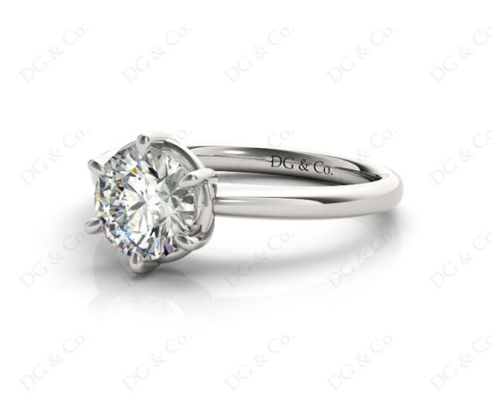 Round Cut Diamond Engagement Ring with Claw set centre stone in Platinum