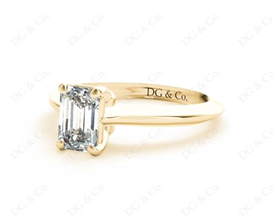 Emerald cut classic diamond solitaire engagement ring in 18K Yellow