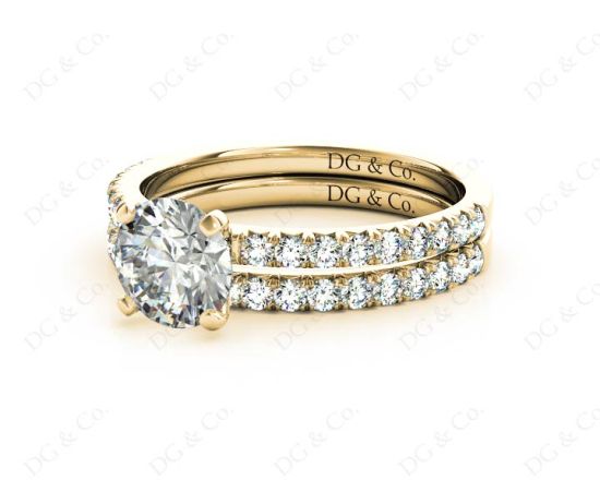 Round Cut Diamond Engagement ring with claw set centre stone in 18K Yellow