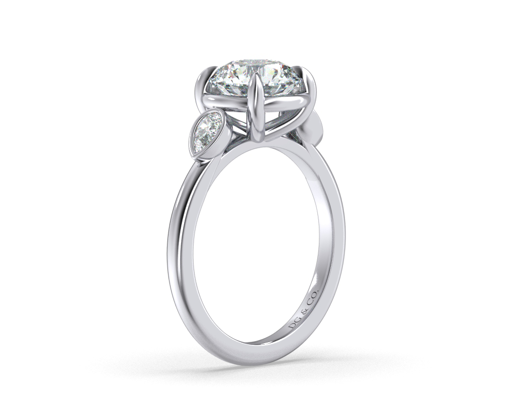 Sima Three stone Round Cut Bezel Four Claw Setting with Pear Shape Cut Side stones -18K White