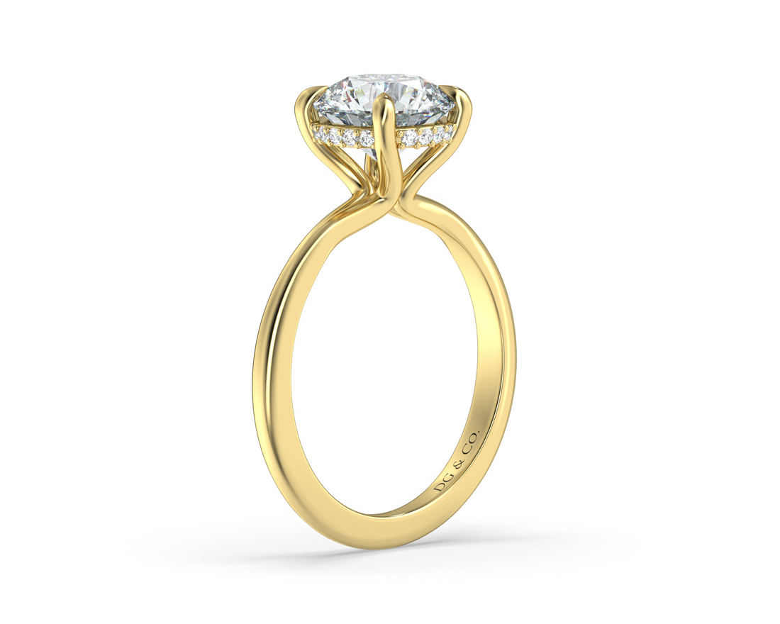 Norma Solitaire Hidden Halo Round Cut Fout Claw Setting Diamond Ring - 18K Yellow