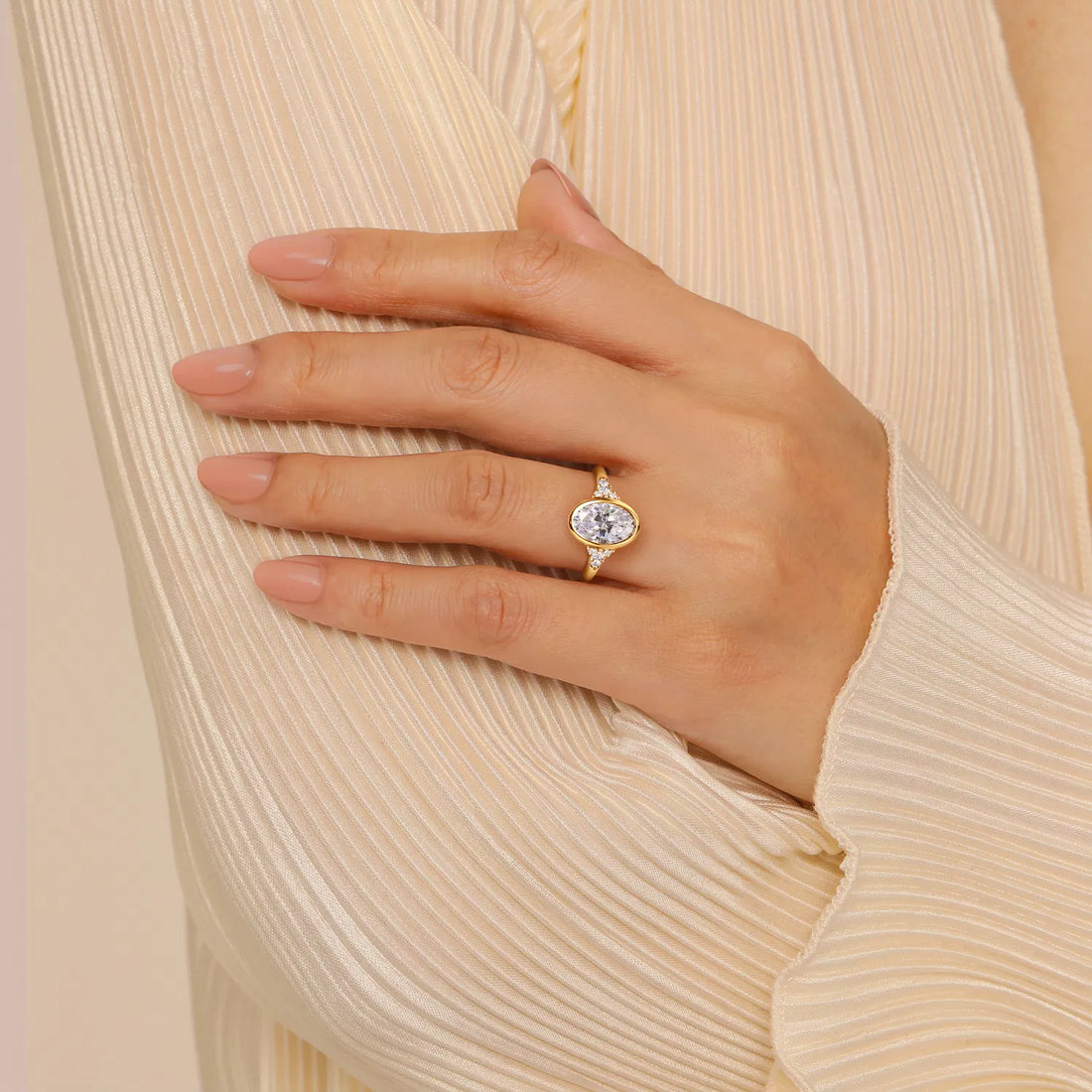Athena Oval Cut Bezel set with side diamonds Engagement Ring - 18K Yellow