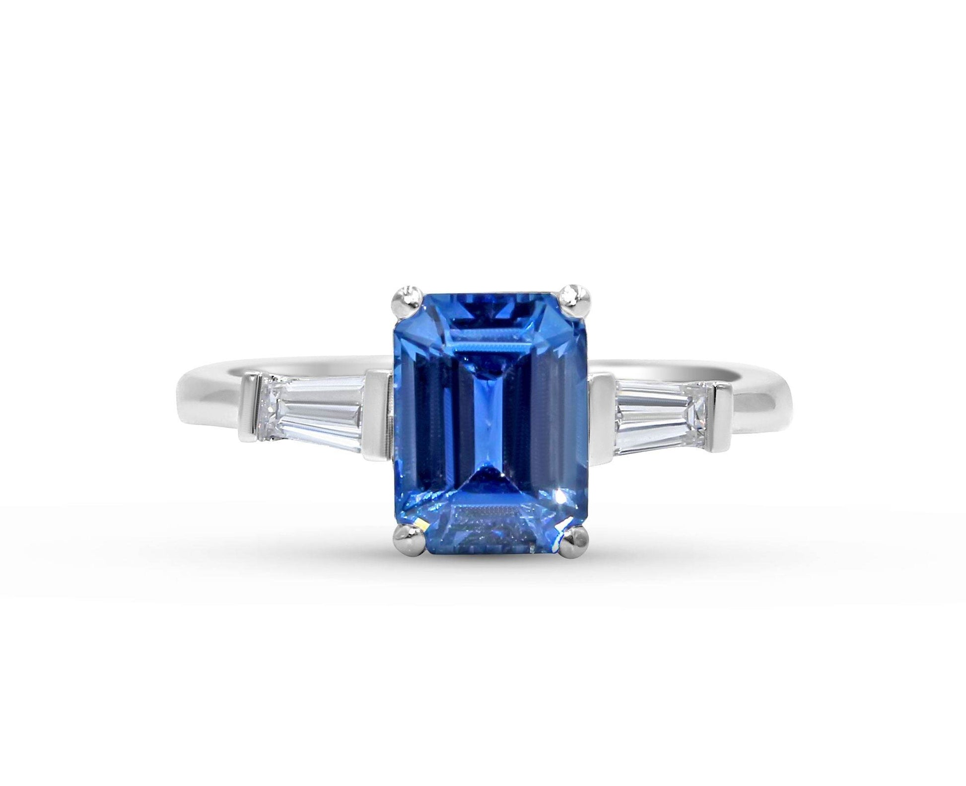 Emerald Cut Ceylon Blue Sapphire Diamond Engagement Ring with Tapered Diamond Shoulder In 18K White Gold - DG & Co. Jewellery