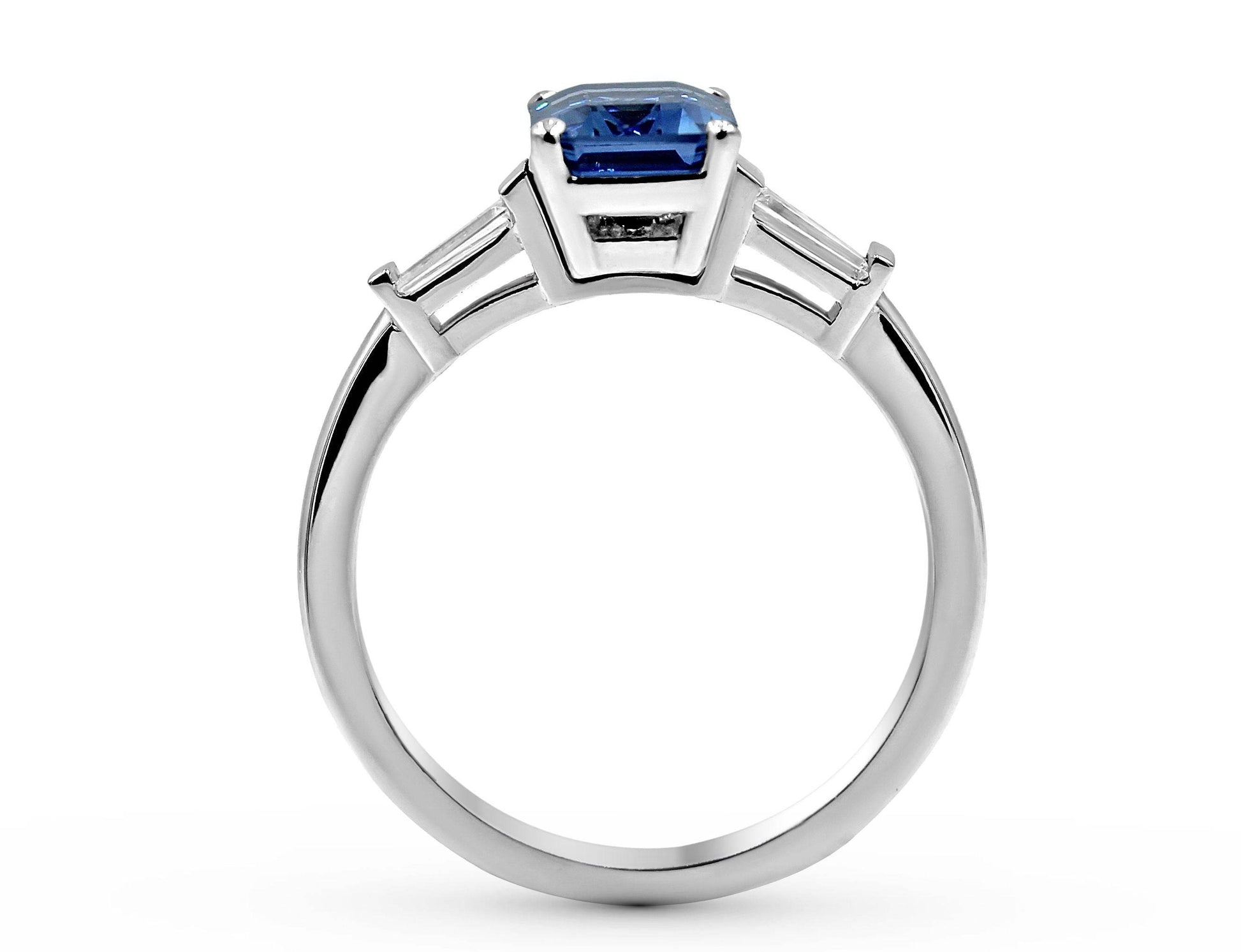 Emerald Cut Ceylon Blue Sapphire Diamond Engagement Ring with Tapered Diamond Shoulder In 18K White Gold - DG & Co. Jewellery