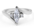 Trilogy Three-stone Marquise Cut Centre Stone Round Cut Side Stones Diamond Engagement Ring in 18K White Gold - DG & Co. Jewellery