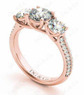 Round Cut Trilogy Diamond Engagement ring with claw set center stone - DG & Co. Jewellery