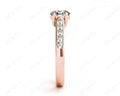 Round Cut 4 Claw Side Stone Engagement Ring with Channel Set Side Stones - 18K Rose - DG & Co. Jewellery