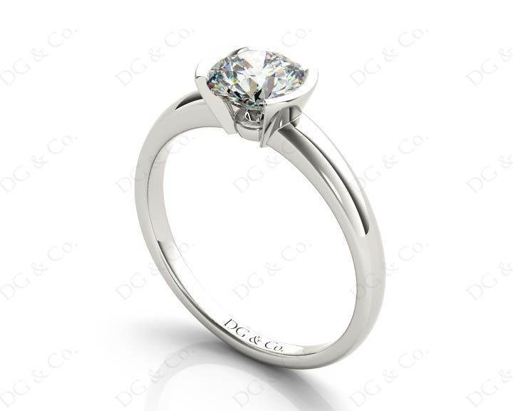 Round Cut Bezel Set Diamond Ring on a Plain Band in Platinum - DG & Co. Jewellery