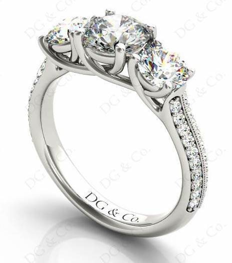 Round Cut Trilogy Diamond Engagement ring with claw set center stone - DG & Co. Jewellery