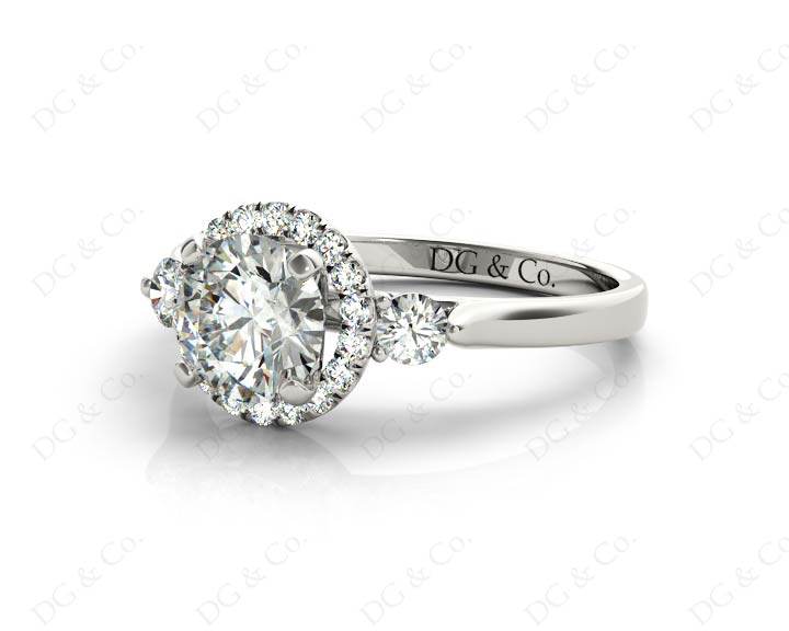 Round Cut Halo Trilogy diamond ring with pave set side stone in Platinum - DG & Co. Jewellery