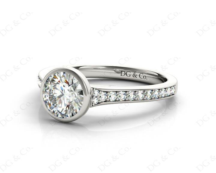 Round Cut Bezel Set Diamond Ring with Channel Set Diamonds Down the Shoulders in 18K White - DG & Co. Jewellery
