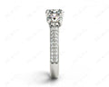 Round Cut Trilogy Diamond Engagement ring with claw set center stone - Platinum - DG & Co. Jewellery