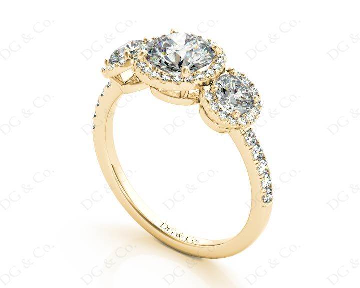 Round Cut Triple Halo Diamond Engagement ring with claw set centre stone in 18K Yellow - DG & Co. Jewellery