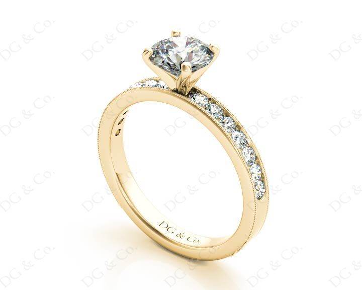 Round Cut Four Claw Set Diamond Ring with Channel Set Side Stones Down The Shoulders - 18k Yellow Gold - DG & Co. Jewellery