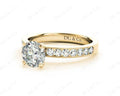 Round Cut Four Claw Set Diamond Ring with Channel Set Side Stones Down The Shoulders - 18k Yellow Gold - DG & Co. Jewellery