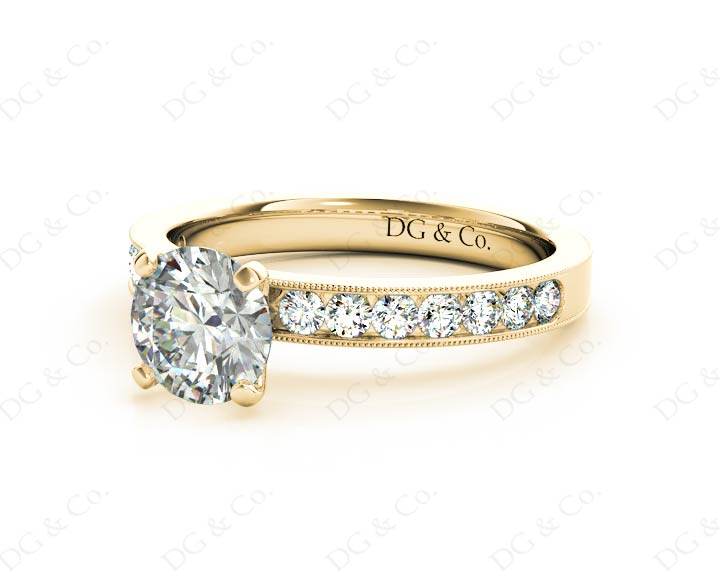 Round Cut Four Claw Set Diamond Ring with Channel Set Side Stones Down The Shoulders - 18k Yellow Gold - DG & Co. Jewellery