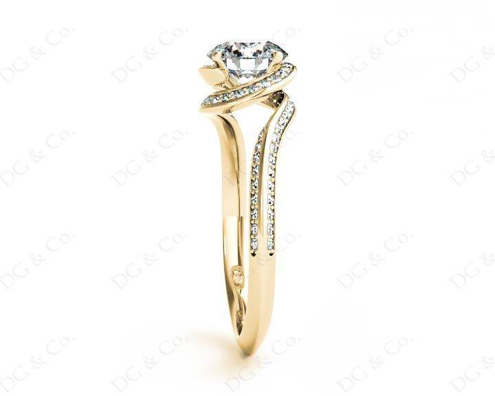 Round Cut Twist band claw set diamond with grain set side stone in 18K Yellow - DG & Co. Jewellery