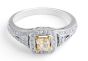Fancy Yellow Cushion Diamond Halo Ring in 18 Karat Diamond rings