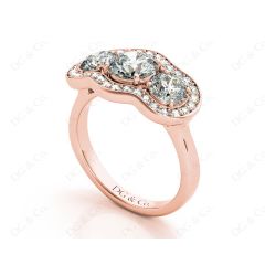 Round Cut Halo Trilogy Diamond Engagement Ring with Pave Set Side Stone In 18K Rose