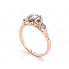 Round Cut Halo Trilogy diamond ring with pave set side stone in 18K Rose