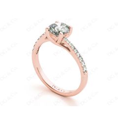 Round Cut Four Claw Set Diamond Ring with Pave Set Diamonds Down the Shoulders in 18K Rose