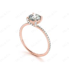 Round Cut Cross Over ring claw set diamond with pave set side stone in 18K Rose