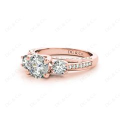 Three Stone Diamond Engagement Ring Round Cut with a Channel Share Prong Shoulder Setting in 18K Rose Gold