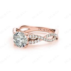 Round Cut Four Claw Set Diamond Ring with Pave Set Stones Down the Shoulders in 18K Rose