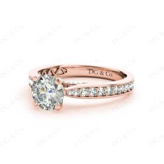 Round Cut Four Claw Set Diamond Ring with Pave Set Stones Down the Shoulders and on Both Sides in 18K Rose