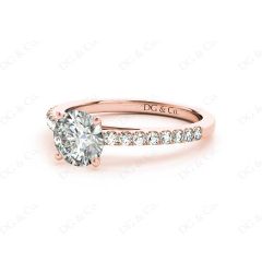 Round Cut Four Claw Set Diamond Ring with Round Pave Set Stones Down the Shoulders in 18K Rose