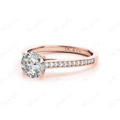Round Cut Four Claw Set Diamond Ring with Round Cut Diamonds Down the Shoulders and on the Setting in 18K Rose