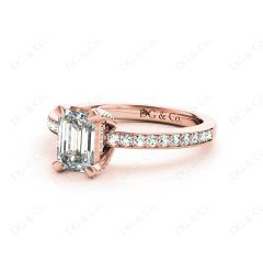 Emerald Cut Four Claw Diamond Ring with grain set side stones in 18K Rose