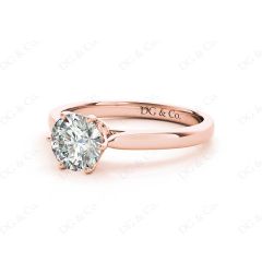 Round Cut Six Claw Set Diamond Ring on a Plain Band in 18K Rose