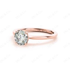 Round Cut Four Claw Set Diamond Ring With a Plain Band in 18K Rose