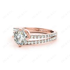 Round Cut Split Shank Diamond Engagement Ring with a Twist Band and Pave Set Side Stones in 18K Rose