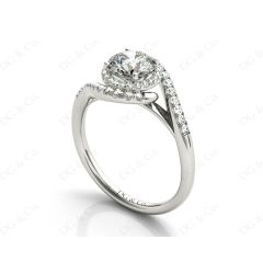 Round Cut Halo Diamond Cross Over Engagement ring with claw set centre stone in Platinum