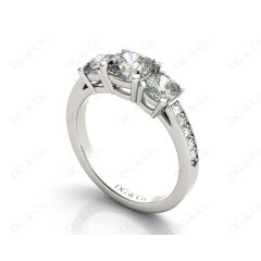 Cushion Cut Trilogy Ring with Channel Set Shoulder Diamonds in Platinum