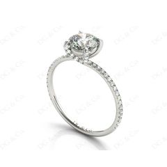 Round Cut Cross Over ring claw set diamond with pave set side stone in Platinum