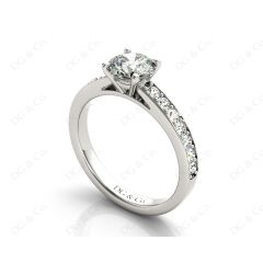 Round Cut Four Claws Set Diamond Ring with Channel Set Side Stones in Platinum