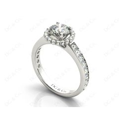 Round Cut Halo Diamond Engagement ring with claw set centre stone in 18K White