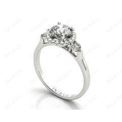 Round Cut Halo Trilogy diamond ring with pave set side stone in 18K White